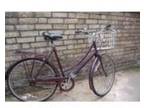 Women's Raleigh Bicycle. This is an older but sturdy and....