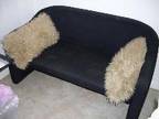 BLACK 2 seater sofa with 2 removable shaggy fur bolster....